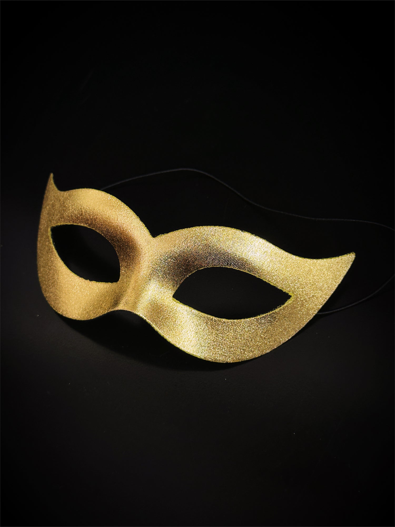 Gold masquerade masks in bulk.