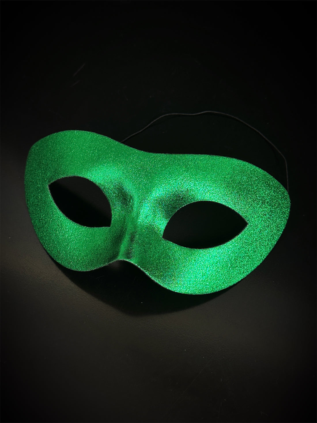 Bulk masquerade masks in green.