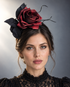 Burgundy Noir Rose Fascinator featuring an oversized dark burgundy rose, black leaves, delicate branches, and slender black headband.