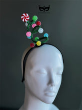 Christmas candy swirl spiral headband with peppermint candy topper and colorful pom accents