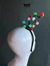 Christmas candy swirl spiral headband with peppermint candy topper and colorful pom accents