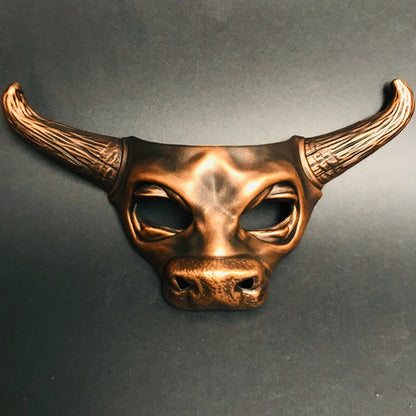 Bold copper bull horn masquerade mask with strong facial structure, perfect for fantasy or myth-inspired events.