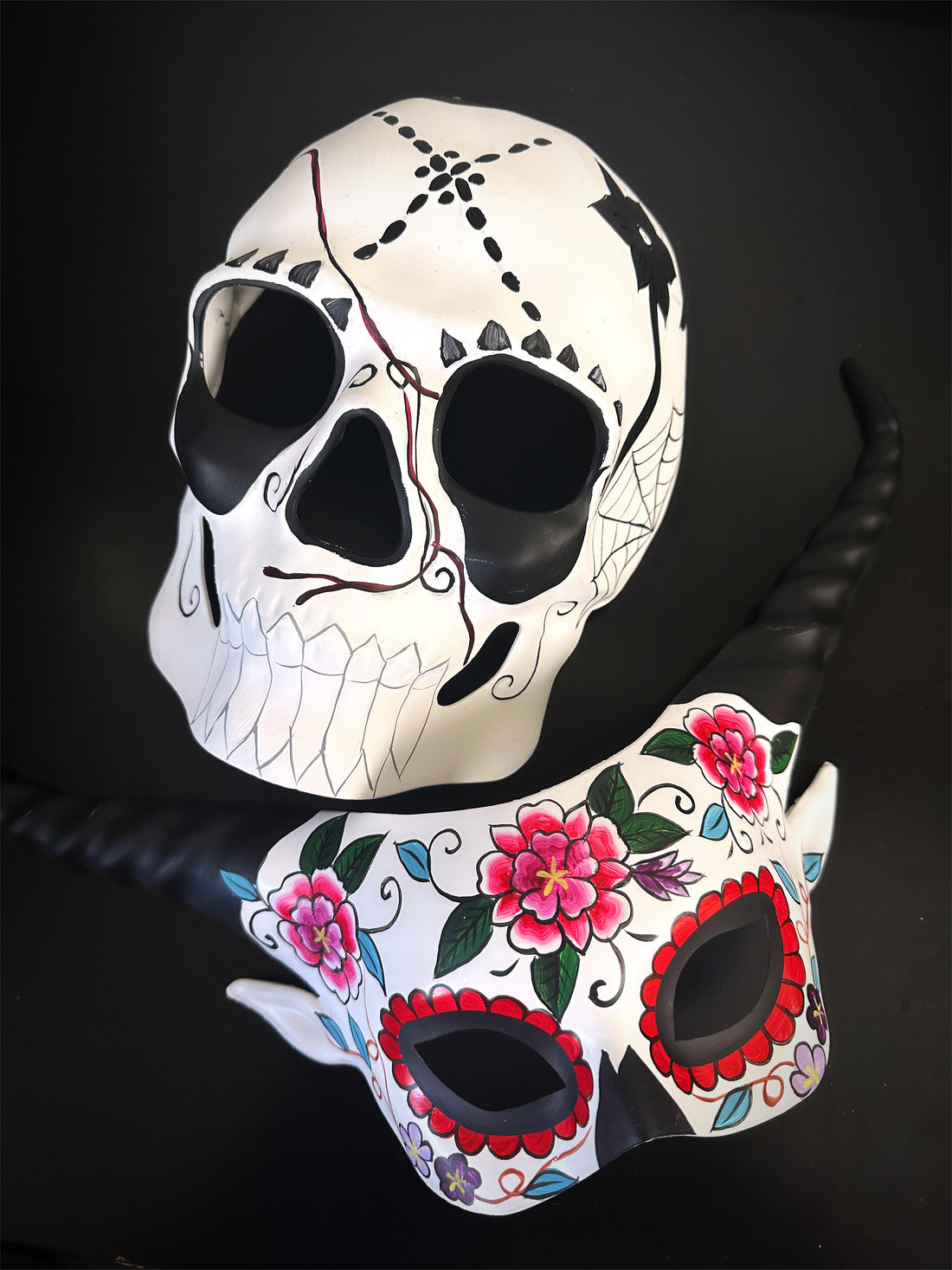 Couples day of the dead masquerade mask set in black and white featuring a skull for the men&
