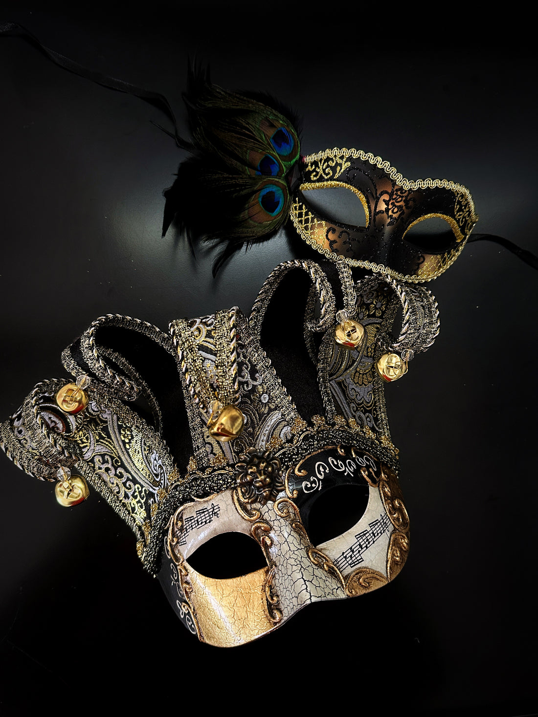 Black and gold Venetian couples masquerade mask set with jester mask and feathered mask, perfect for Mardi Gras, Carnival, Halloween, or masquerade ball.