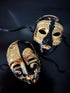 Black and gold couples masquerade mask set with Venetian baroque swirls and music note details, ideal for prom, Halloween, or masquerade ball.