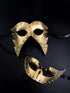 Masquerade mask set for couples in gold pleather with studs and spikes.