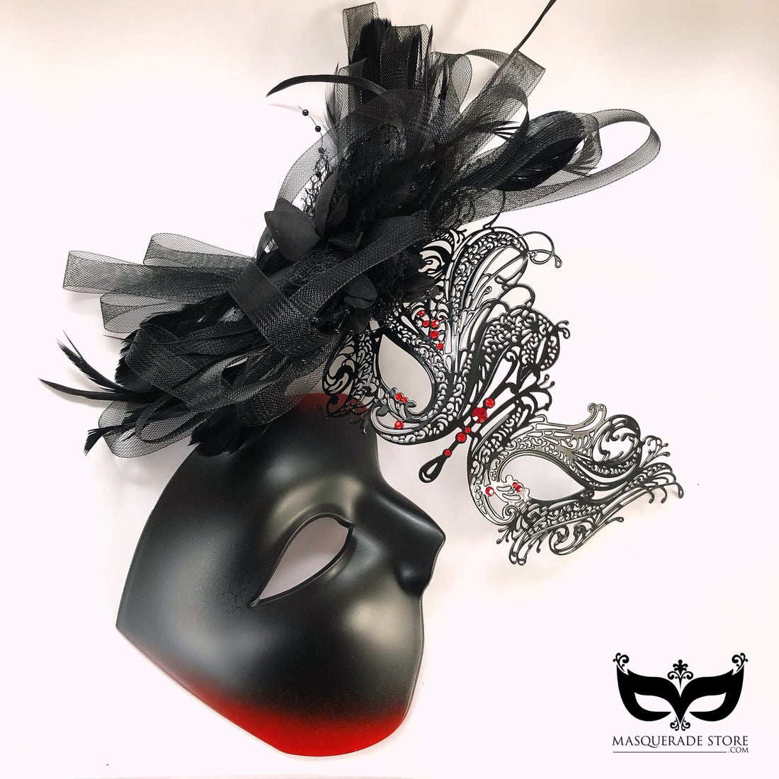 Black metal mask with red rhinestones and black feathers. Black/red ombre phantom mask.