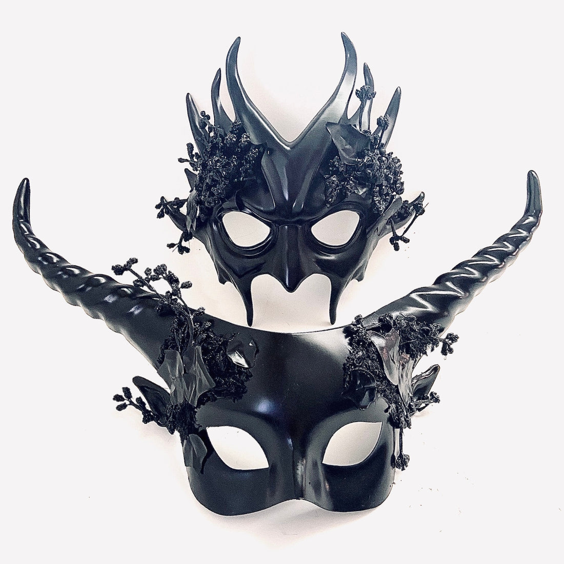 Couples masquerade mask set in black with forest foliage for sale.