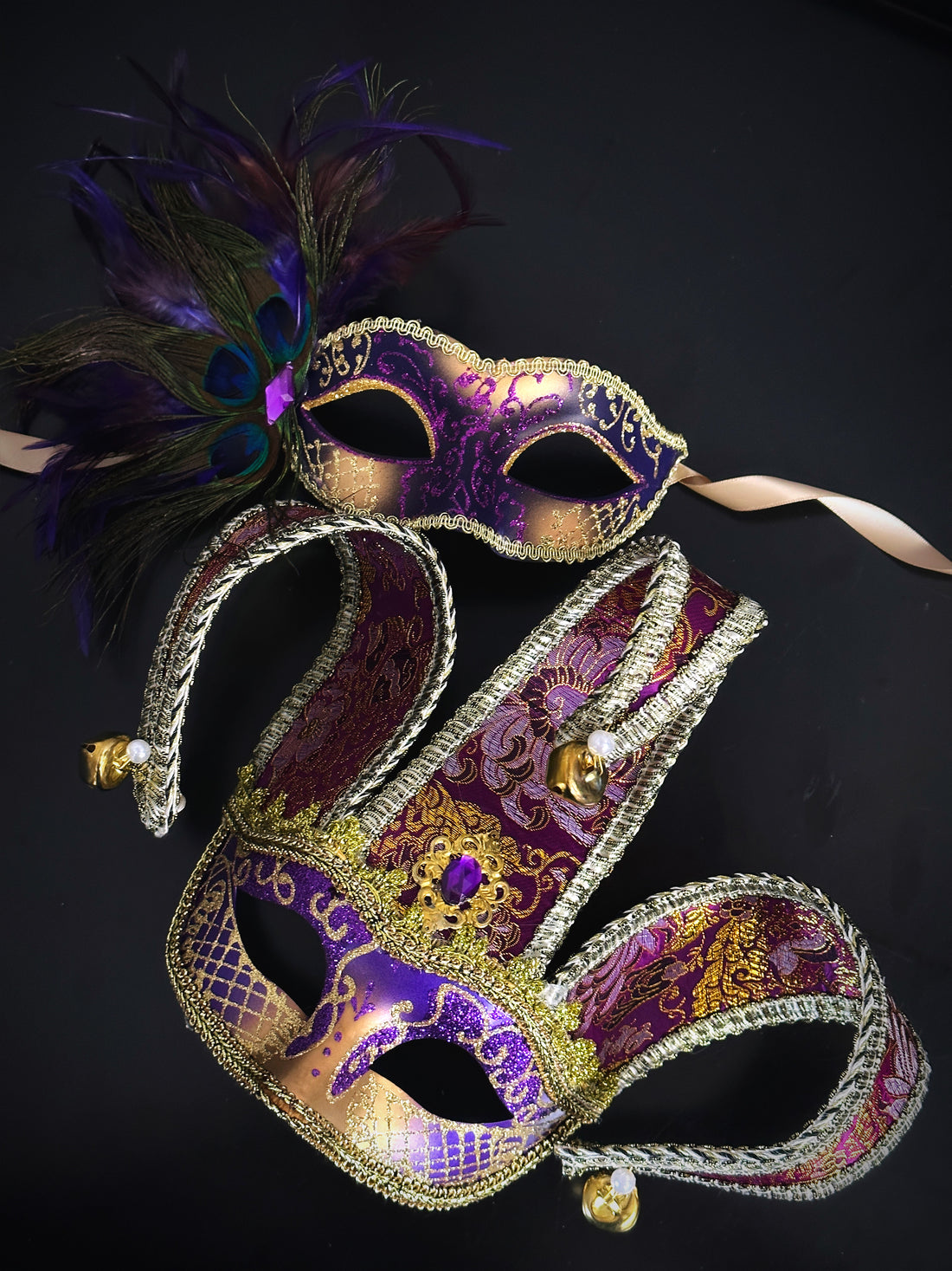 Couples masquerade masks in gold purple Venetian jester style for sale.