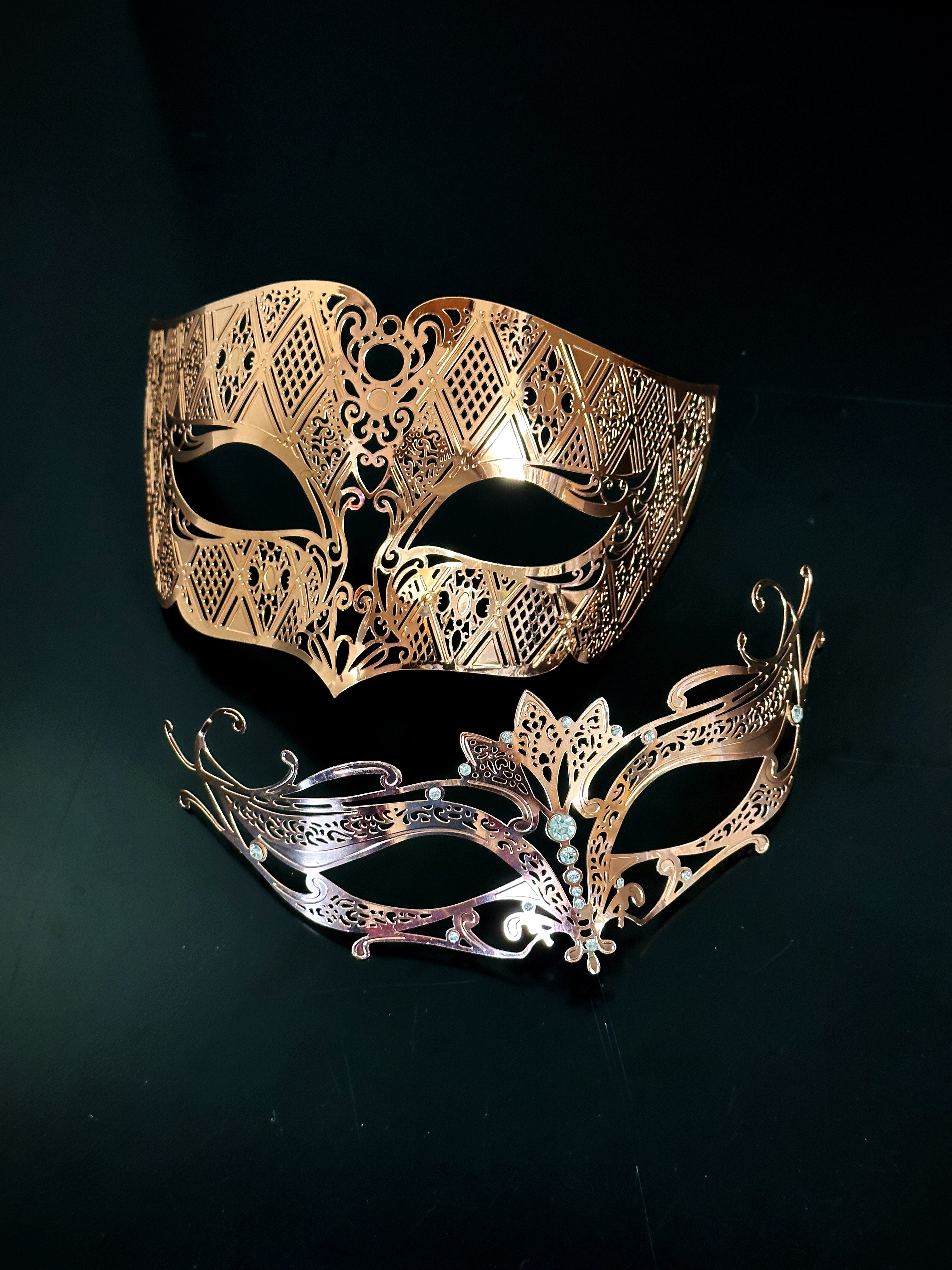 Couples metal masquerade masks in rose gold for sale.