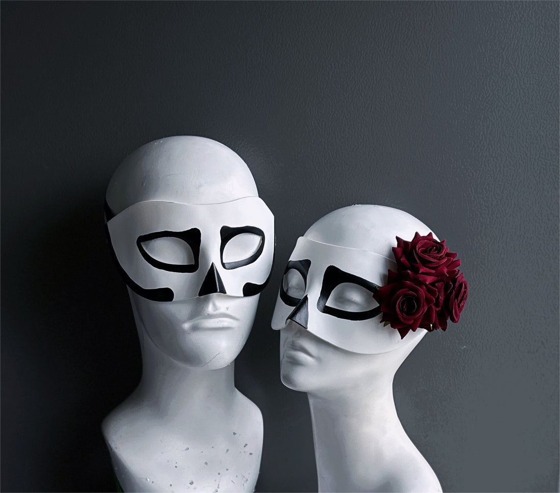 Skeleton couples masquerade mask set with red rose detail for Dia de los Muertos.