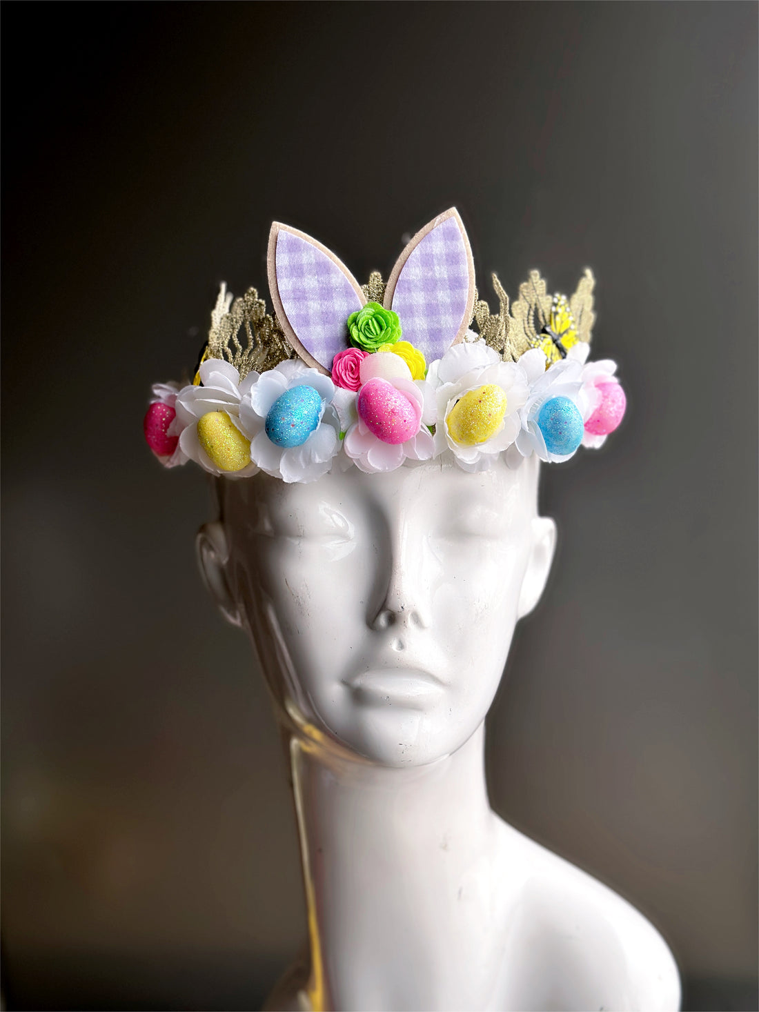 Whimsical spring bunny ear crown with pastel floral and egg accents