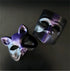 Purple and black dual-style masquerade mask set with cat and modern face designs for theatrical events.