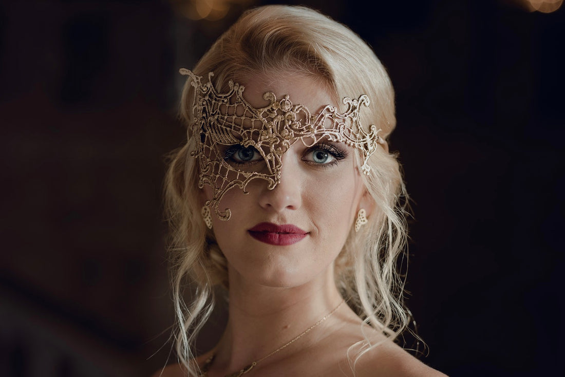 Ornate gold masquerade mask with regal scroll details, perfect for bridal balls or galas