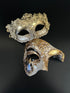Matching gold masquerade mask set for couples featuring floral filigree and baroque finish