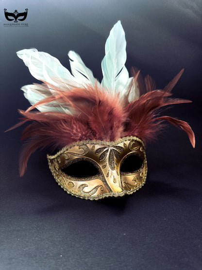 Gold masquerade mask with glitter details and red and white feather plumes for Mardi Gras and balls