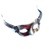 Fantasy masquerade mask with curved black and bronze horns and gold detailing