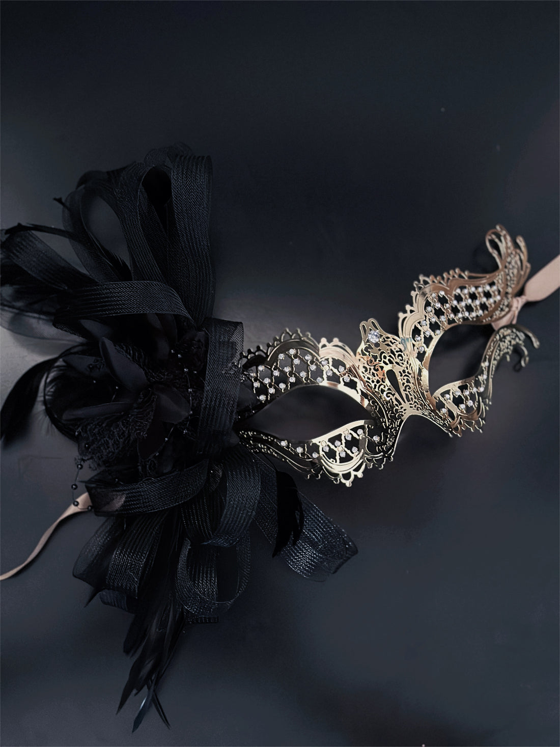 Gold katherine mask with black tulle it’s perfect for Halloween parties or masquerade balls because being bad never looked so good.