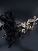 Gold katherine mask with black tulle it’s perfect for Halloween parties or masquerade balls because being bad never looked so good.