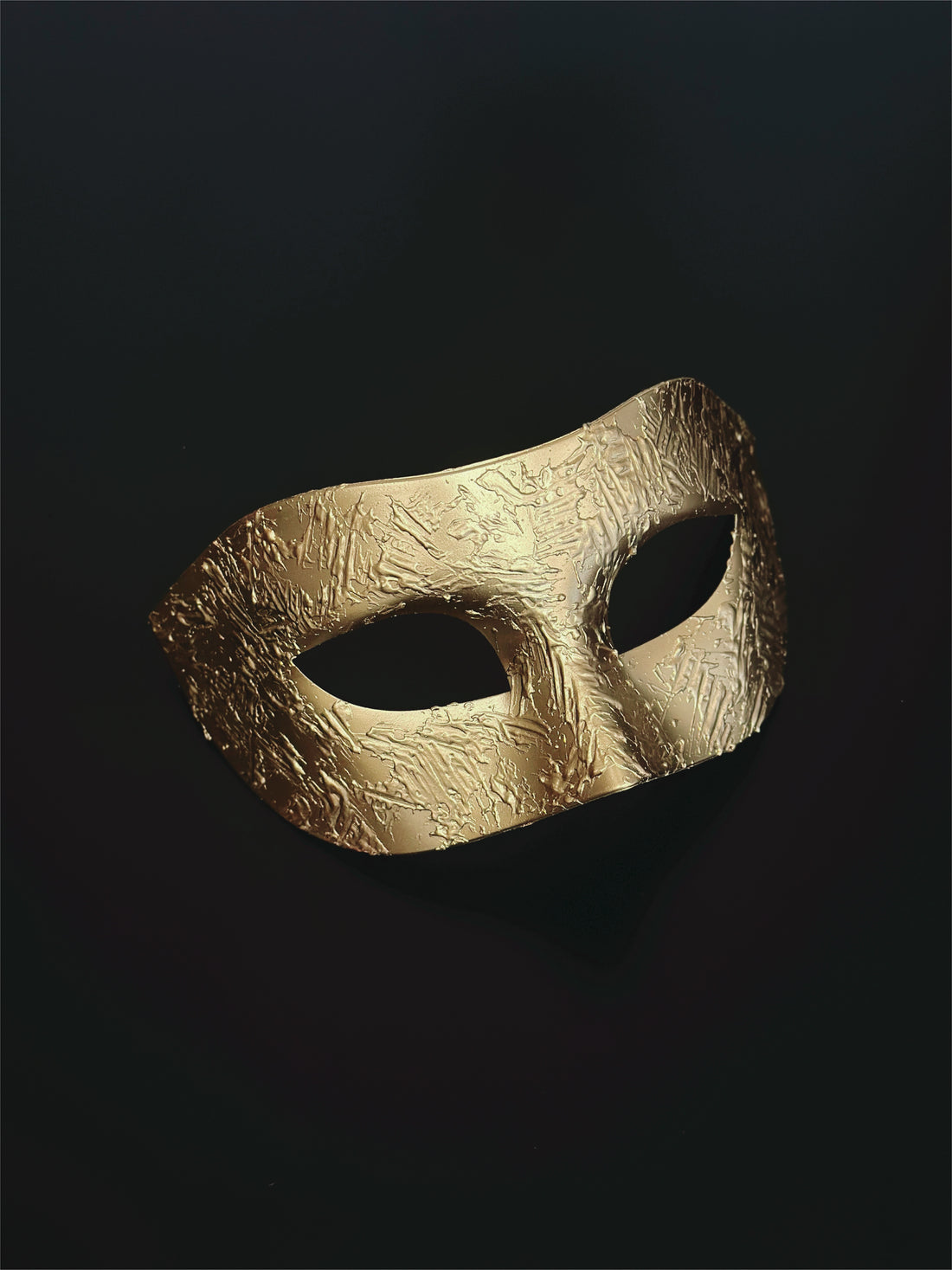 Gold textured Venetian masquerade mask with rough embossed design for men and women.