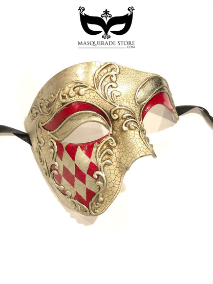 Gold Venetian masquerade mask with red phantom diamond accents for Mardi Gras and Carnival.