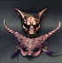 Elegant gold masquerade masks for couples with twisted horns, floral embellishments, and wolf design