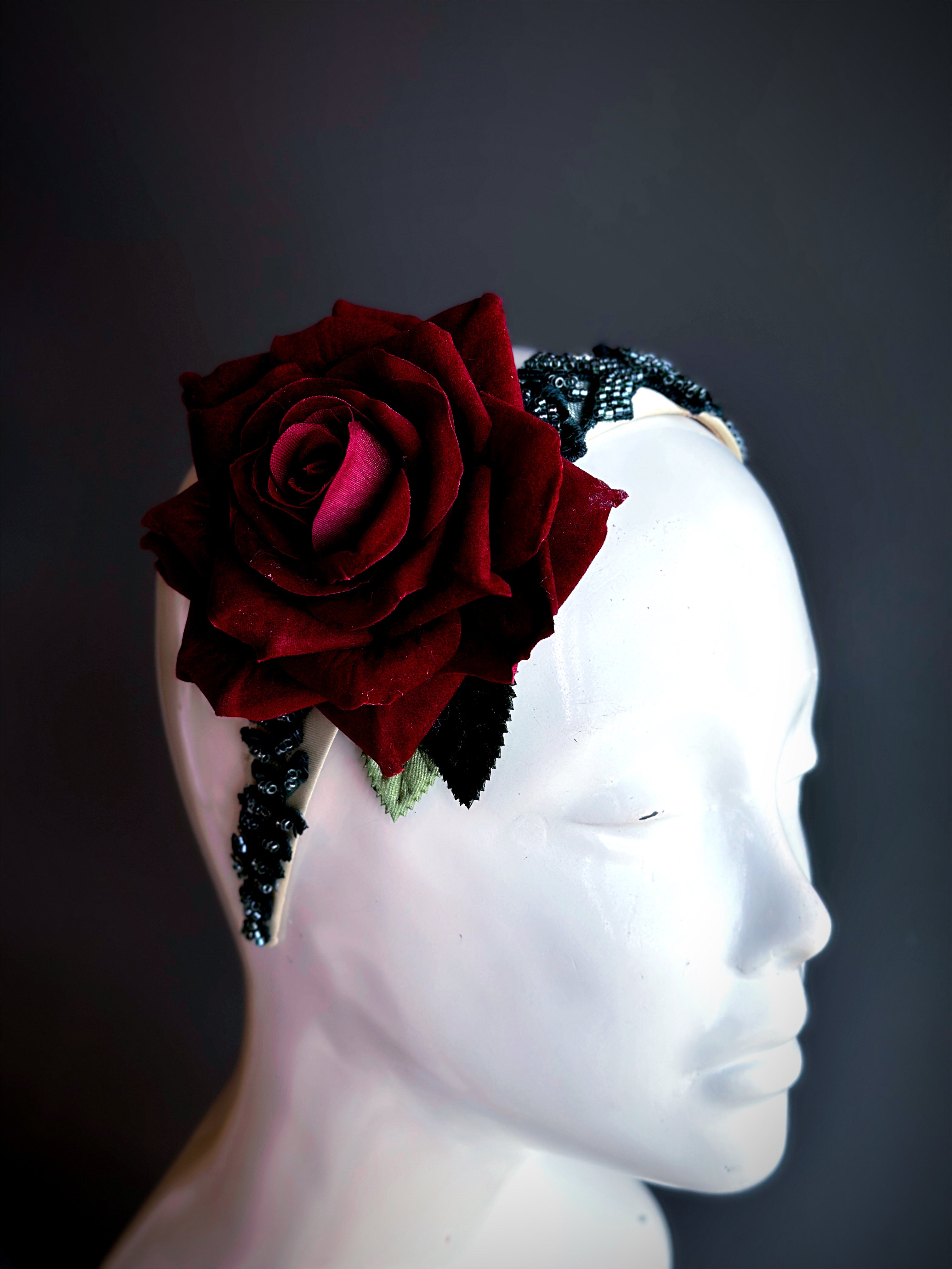 Elegant gothic red rose headband with black lace and beaded accents, perfect for Halloween, Day of the Dead, weddings, and masquerade looks.
