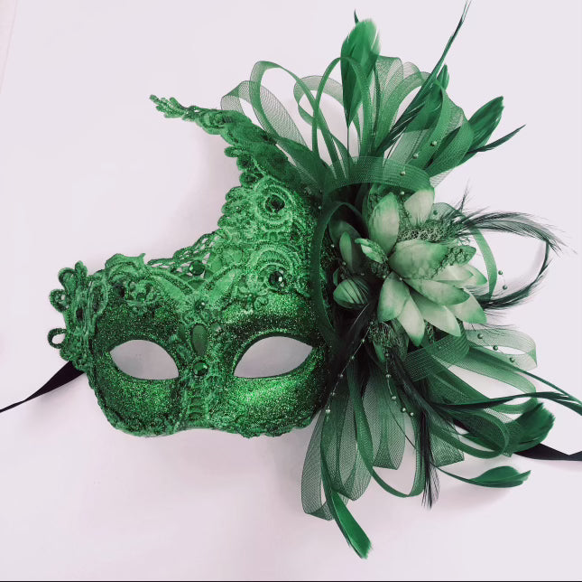 Floral feather masquerade mask in green with lace for Mardi Gras or costume events