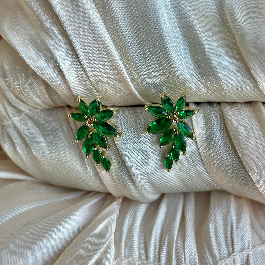 Emerald green leaf earrings with gold setting and marquise-cut stones for elegant everyday or special occasion wear