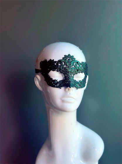 Green lace masquerade mask with floral cutout design, perfect for prom, masquerade ball, or Halloween party.