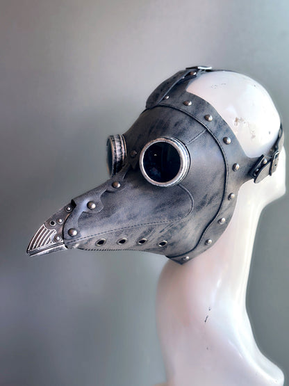  Steampunk-inspired grey masquerade mask with metal accents and a dramatic beak