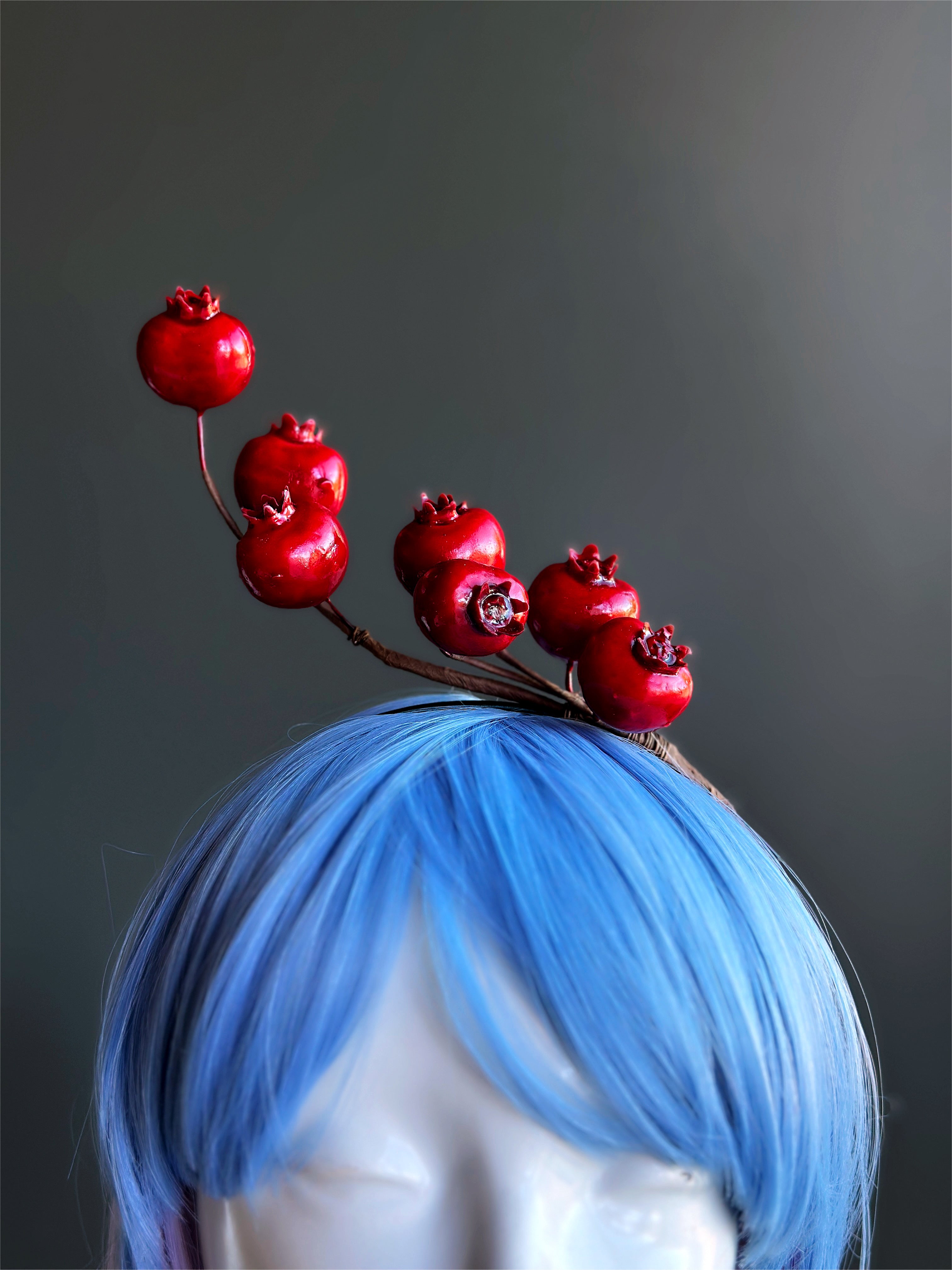 Red pomegranate headband.