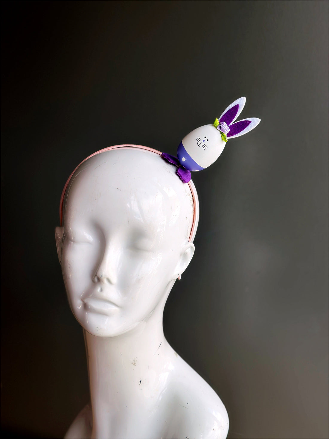 White and purple easter bunny on a pink headband