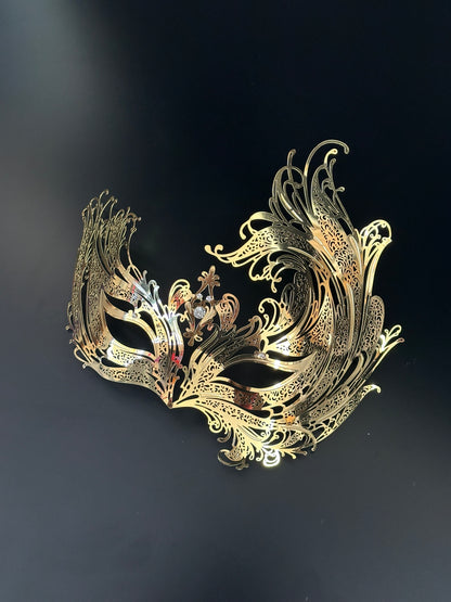 metal mask in gold with clear crystals