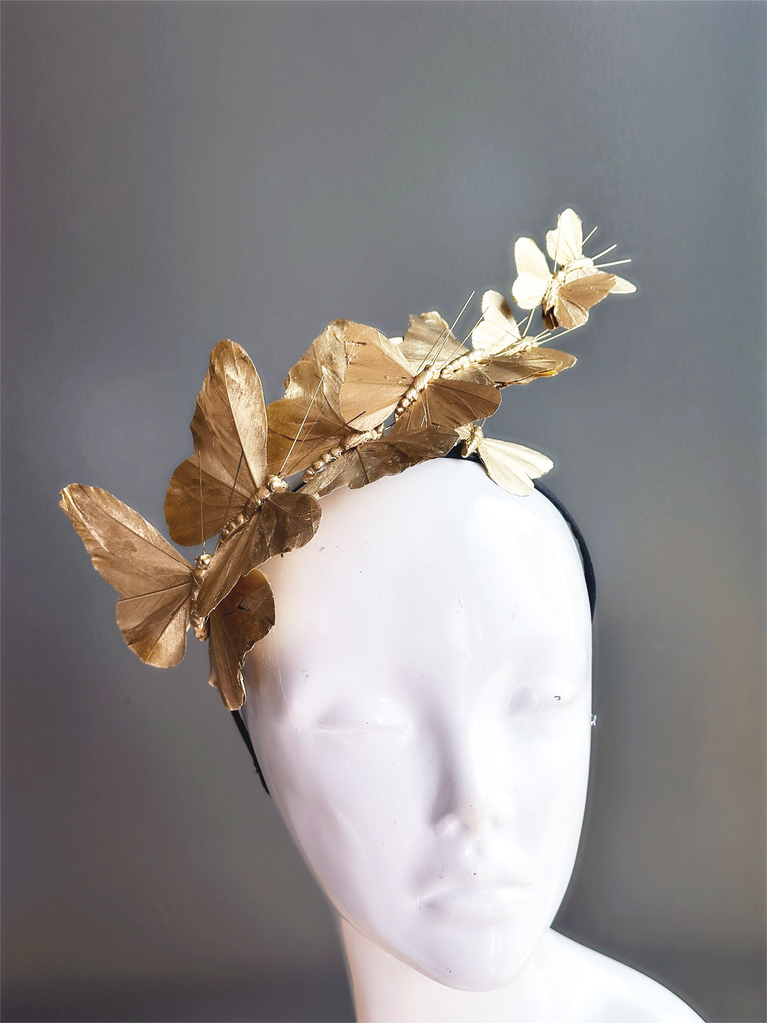 Gold butterflies on a black headband