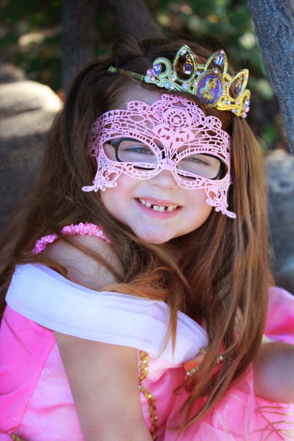 Kids pink lace masquerade mask.