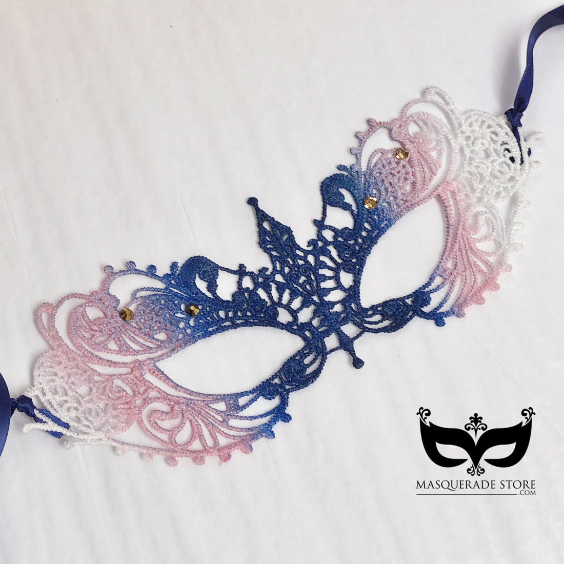 Lace masquerade mask in pink, blue, and white Ana with rhinestone accents for prom, parties, and masquerade balls.