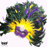 Colorful Mardi Gras feather mask in traditional carnival colors with dramatic plumes and sparkling details