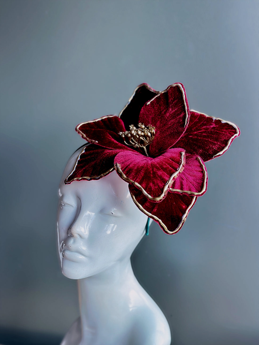 Dramatic red and gold masquerade flower fascinator hat for women, perfect for galas, prom nights, or holiday masquerades.