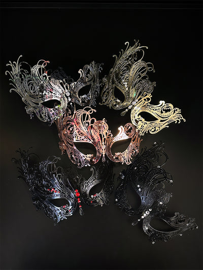 Laser cut metal mask in rose gold, black, silver, or gold with crystals.