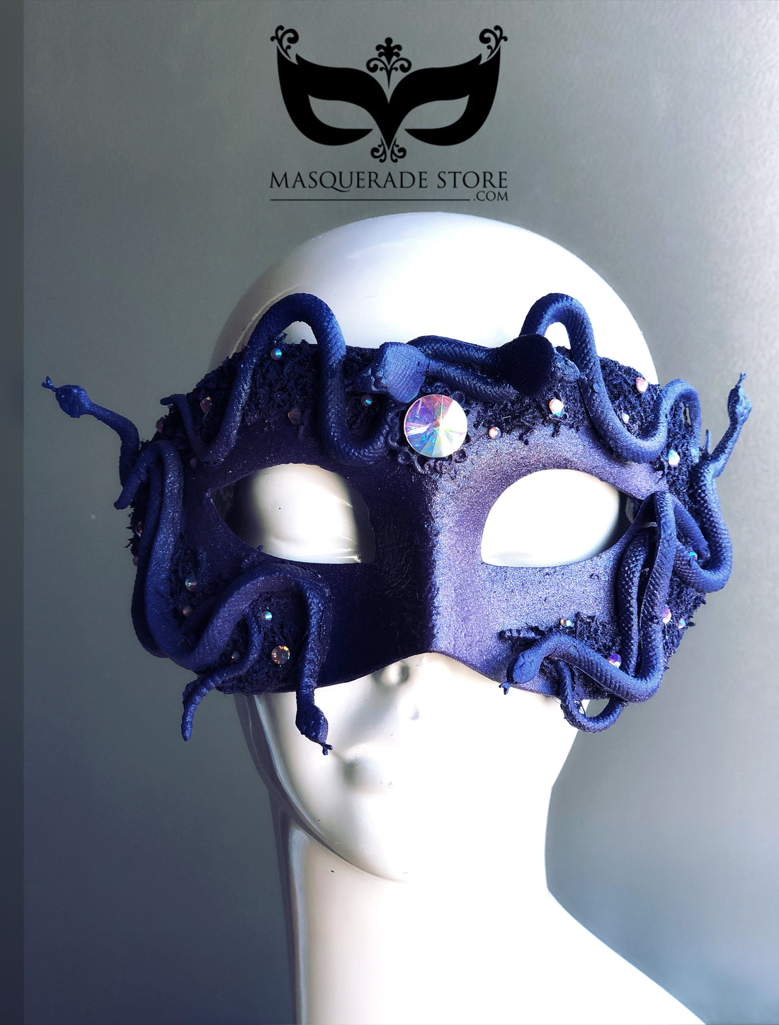 Navy masquerade mask with snakes and rhinestone accents inspired by Medusa for Halloween, cosplay, and gothic masquerade parties.