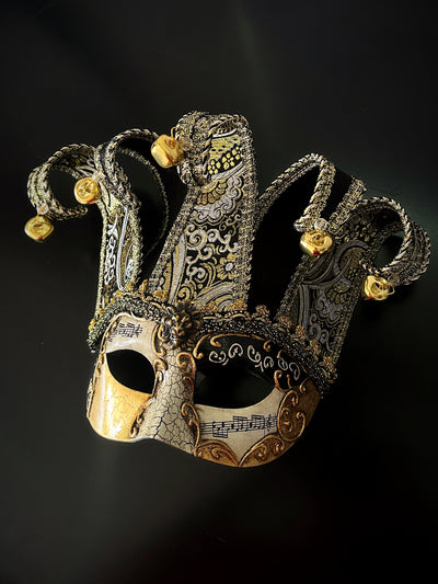 Men's jester masquerade mask in gold black.