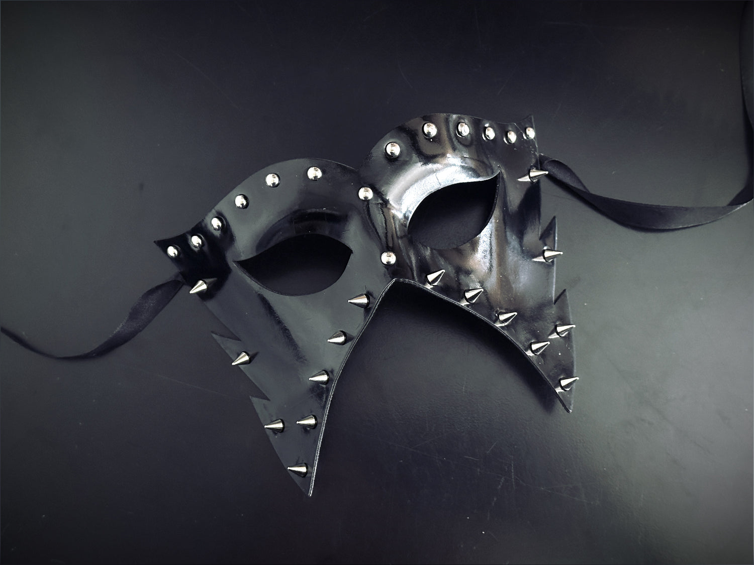 Mens masquerade mask black pleather with silver spikes and studs.