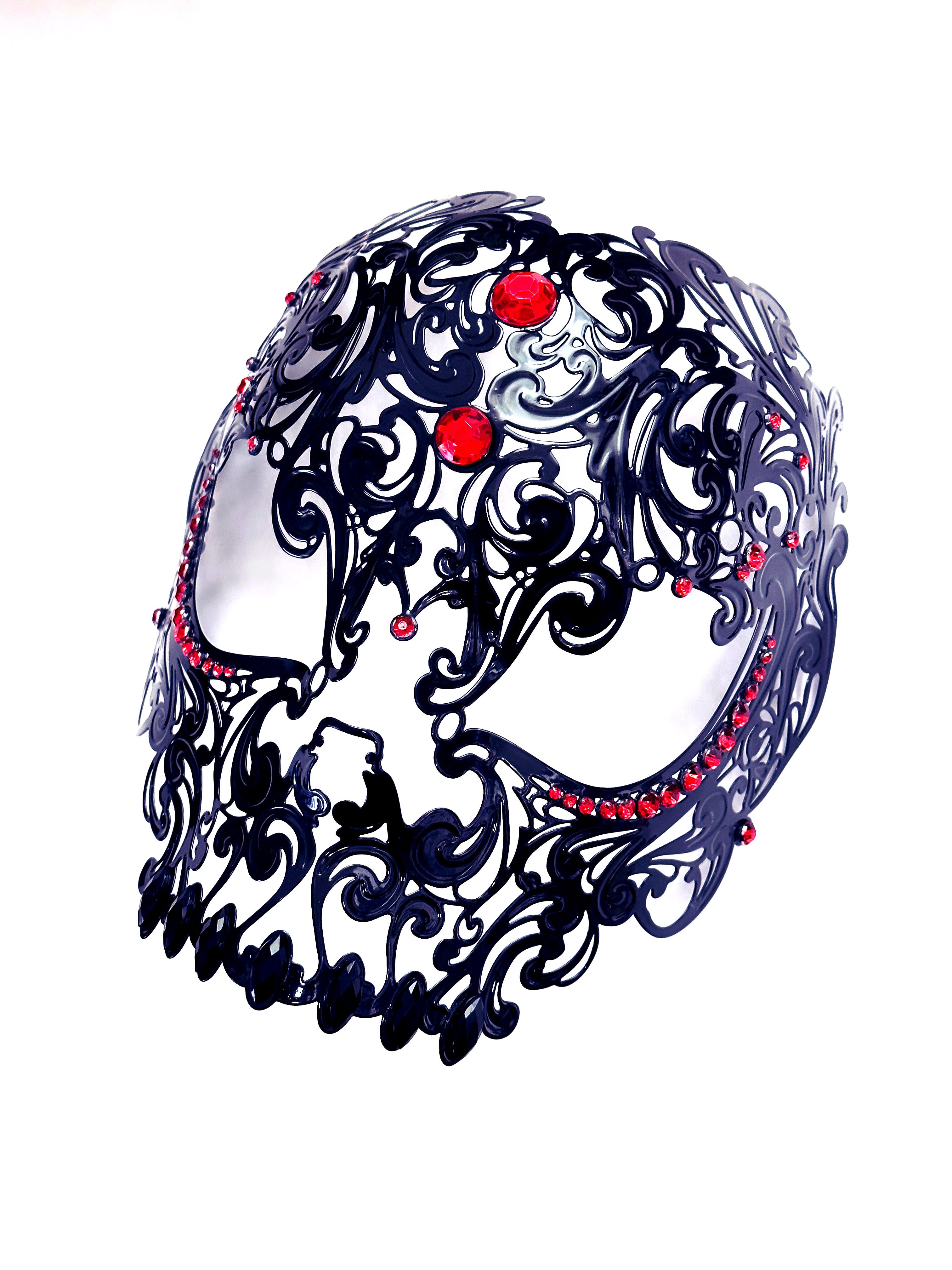 Metal skull masquerade mask in black with red stones.