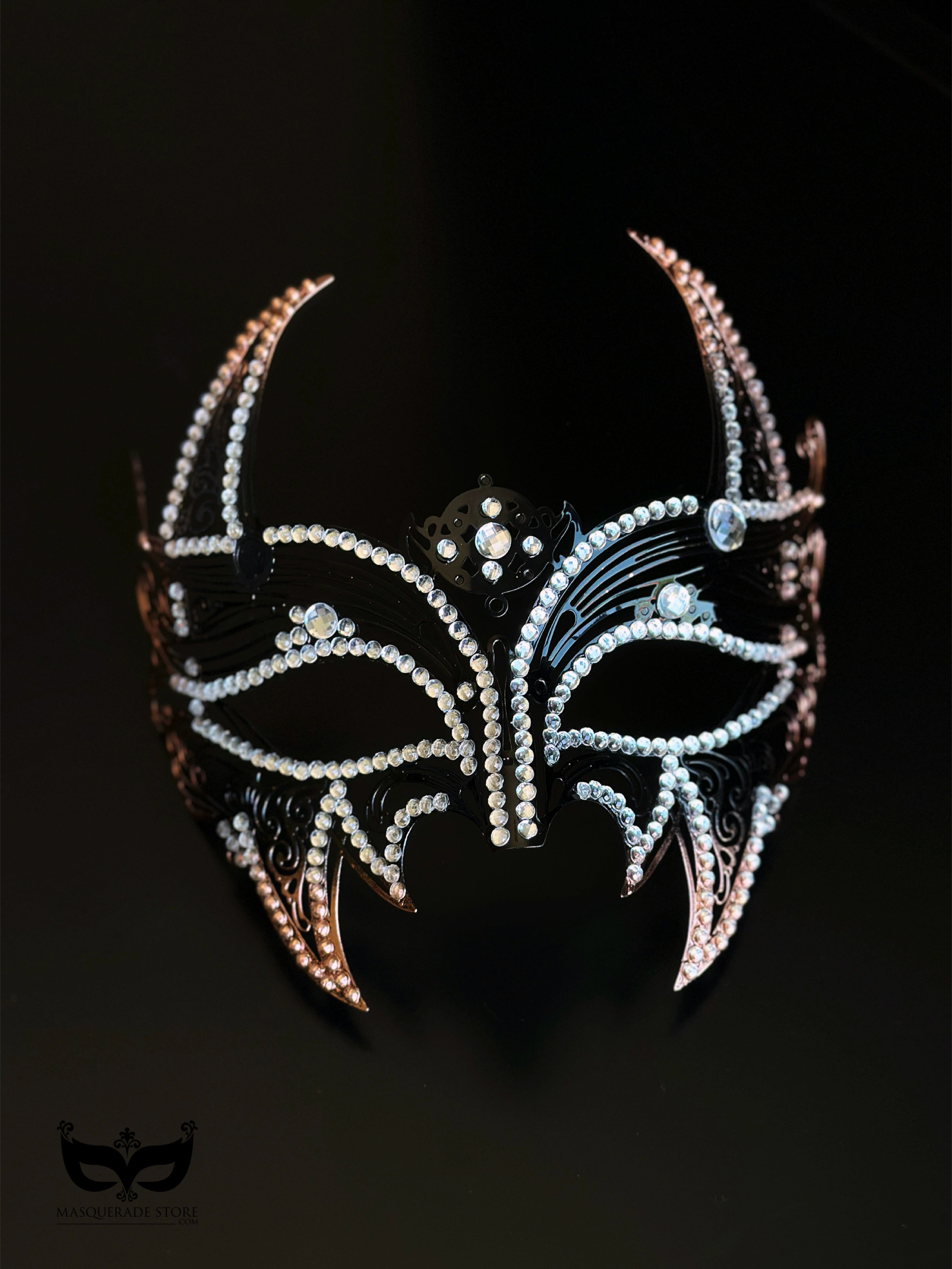 Midnight Inferno black horned crystal masquerade mask with clear rhinestones, tall curved points, gothic openwork details, and Halloween styling.