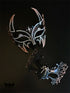 Midnight Inferno Halloween couples mask set with black rhinestone horned mask and black silver spiderweb filigree mask with crystal accents.