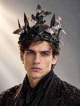 Midnight Moth Crown with black textured pointed silhouette, gray and white moth decorations, and sculptural geometric accents.