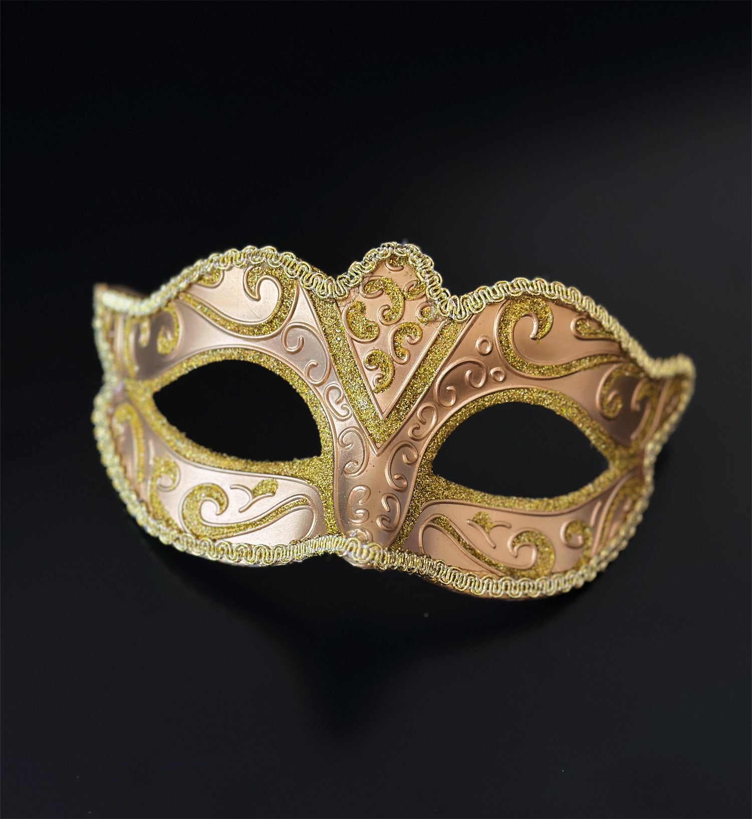 Champagne Venetian masquerade mask with gold glitter scroll detail for elegant formal events.