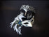 Silver and black masquerade mask set with peacock feathers and crown accents for prom, Mardi Gras, or ball-themed couples costumes