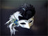White and black masquerade mask set with peacock feathers and crown accents for prom, Mardi Gras, or ball-themed couples costumes